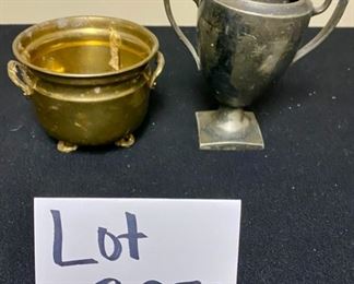 Lot 3350.  $38.00.  Vintage Brass Lot. The star of the show is this brass footed trinket box with swan finial from Andrea by Sadek (7.5 x 7.5 x 5.5"h) also includes a brass candlestick (12"h), brass chamber candle holder (4"), brass pot by Hosley, and a double-handled challis with "W" and 211 on the bottom.		