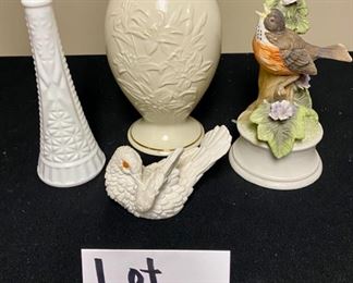 Lot 3351. $52.00. Lenox vase (8"x4.5"dia), milk glass bud vase, Royal Crown Robin Bird Music Box (7"h in porcelain), and a white alabaster love bird made in Italy