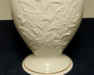 Lot 3351. $52.00. Lenox vase (8"x4.5"dia), milk glass bud vase, Royal Crown Robin Bird Music Box (7"h in porcelain), and a white alabaster love bird made in Italy