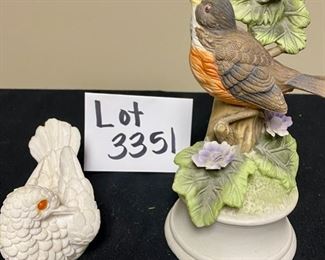 Lot 3351. $52.00. Lenox vase (8"x4.5"dia), milk glass bud vase, Royal Crown Robin Bird Music Box (7"h in porcelain), and a white alabaster love bird made in Italy