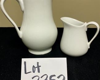 Lot 3353. $45.00. Pitcher Collection: 2 Cordon Bleu 5" and 9" pitchers, 1 Chantal Pitcher 6.5"h, 1 Mikasa 4" high, 1 unbranded ceramic 7.5"		