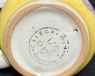 Lot 3325. $25.00  6 pc Ceramic ware made in the USA by Ada.  includes; Cobalt butter dish; "Caleca" creamer made in Italy; 2 mini loaf pans, small utensil jar, covered jar.		