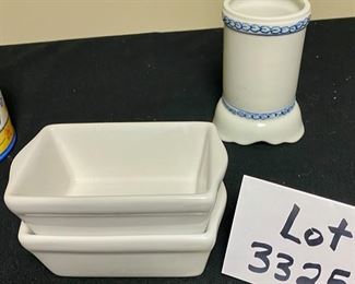 Lot 3325. $25.00  6 pc Ceramic ware made in the USA by Ada.  includes; Cobalt butter dish; "Caleca" creamer made in Italy; 2 mini loaf pans, small utensil jar, covered jar.		
