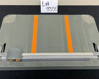 Lot 3355.  $30.00.  Fiskars Rotary Trimmer Papercutter and Archival Storage Box 		