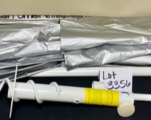 Lot 3356. $35.00.  Solar Reflecting Beach Umbrella with pole and secure Earthworm Sand Grabber Base		