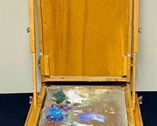 Lot 3358.  $75.00.  Vintage Grumbacher #286 French Easel Field Box. Made in France. The homeowner is an amazing artist, may this inspire your creativity! 19.5 x 12". Here's some info on restoring this lovely piece! http://levineartstudio.com/vintage-grumbacher-286-french-easel/ 	