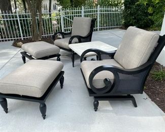 Lot 3152. $875.00. Smith & Hawken 5 pc Set two swivel chairs, with cushions, two ottomans, with cushions, and a square side table.  The owner paid $2570. They are in perfect condition!