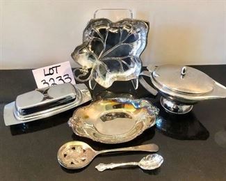 Lot 3233. $44.00 Great Servers for your holiday celebrations.1) Silver-plate leaf dish, 2) International Silver Co. #443 dish, 3) Covered gravy boat with hinged lid, 4) Covered butter dish, 5) Sheffield England spoon and 6) International deep Silver spoon.