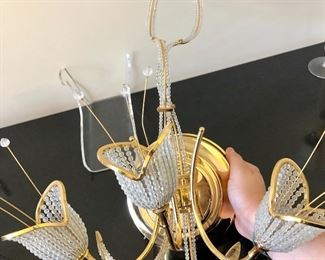 Lot 3238.  $180.00  1  Beautiful Beaded tulip sconce with three flowers. Gold tones, Progress Lighting.	16"W x 10" H x 10" diameter base plate.  Very Unique, could work in Hollywood Regency or Art Deco.  