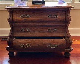 Lot 3184. $250.00   Vintage Hekman 3 drawer oak chest w/rounded lines and antique brass pulls. 18"D x 30"W x 25"H	 So cute Bombe style!