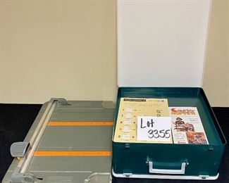 Lot 3355.  $30.00.  Fiskars Rotary Trimmer Papercutter and Archival Storage Box 		