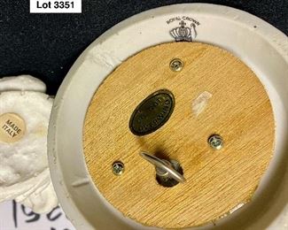 Lot 3351. $52.00. Lenox vase (8"x4.5"dia), milk glass bud vase, Royal Crown Robin Bird Music Box (7"h in porcelain), and a white alabaster love bird made in Italy