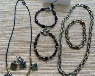 Jewelry & Misc. Lot 5 - $40.00. 6 pieces of attractive costume jewelry, including 2 black beaded bracelets for a slender wrist, 1 Modern Art Necklace, 1 pair of matching earrings, and 1 Serpentine "braided" necklace and a matching bracelet in gold, silver, and copper tone metals.  Nice lot.