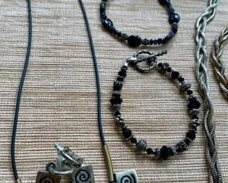 Jewelry & Misc. Lot 5 - $40.00. 6 pieces of attractive costume jewelry, including 2 black beaded bracelets for a slender wrist, 1 Modern Art Necklace, 1 pair of matching earrings, and 1 Serpentine "braided" necklace and a matching bracelet in gold, silver, and copper tone metals.  Nice lot.