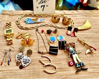 Jewelry & Misc. Lot 7 - $50.00. The Bonanza of costume jewelry lot!  18 pieces, including 1 gold tone necklace, 1 Jones NY watch, 1 Cute Lady Shopper pin, 1 Bracelet, 9 pairs of earrings (Newpro, Monet, and Shye or could be Skye) 1 angel. 1 ladies golf pin, gold-tone pin, one stick pin, and 1 Irish Claddaugh bracelet.   Get cute little gift bags and a little tissue paper, and you've done 17 of your gal pal Christmas gifts in one click!