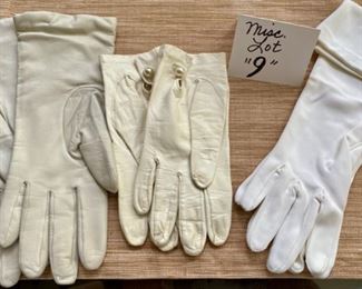 Jewelry & Misc. Lot 9 - $40.00. Three pairs of ladies gloves include: One Ivory or off-white leather pair from Fownes, Sz. 7 with 100% cashmere lining (the best!) mid-arm length, one pair cream buttery leather short gloves, sz 7 with pearl closures, and lastly, one pair of opera long gloves (reminds me of what we wore way back when to a school formal dance, lol) great shape, and they appear to be the same size 7.  