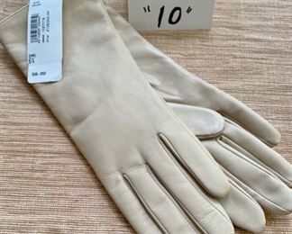 Jewelry & Misc. Lot 10 - $24.00. Brand New, Buttery Leather, Cream Colored gloves, mid-arm length, Nordstrom brand, size 6-1/2. and Nordstrom Price Tag of $58.00 Gift Sticker attached.  100% cashmere lining.  Pamper yourself this winter after this horrendous year; you deserve something warm, soft and fashionable!