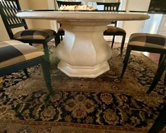 Lot 3173. $2,600.00 OOOHHH! Look at that base! Fabulous Remi Lugano Limestone table with custom beveled glass top and 6 "Emerson et Cie" Dining Chairs.   (The Company's name had its origin in the French tradition of adding "et Cie" to indicate a family-owned business,  and this six-generation company moved to High Point, NC.  to take advantage of the skilled labor force for furniture building.)  The owner paid $2,350  for the table alone, an additional $1,000 for the custom cut beveled glass)  and the six chairs with custom upholstery were no doubt a fortune, as nothing from Emerson et Cie is cheap!  The table measures 58" round x 30"H; Chairs: 37"H to back, 21"W x 19"D x 20" H to seat.  You will need to have professionals move it for you.  The table is in two pieces plus the glass. 