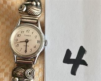 $45.00.    Vintage Navajo sterling silver watch tips designed for a woman.  The watch is sold as is - you can add any watch that you prefer.