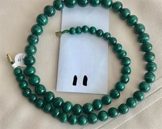 $45.00.   Lovely graduated bead malachite necklace.  Measures 20.5" long.  Screw clasp.