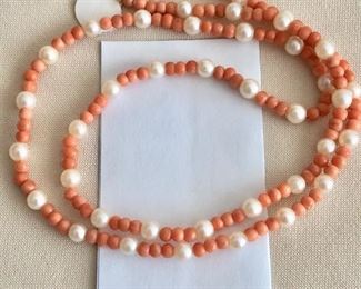 $75.00    Beautiful angel skin coral and cultured pearl necklace with a 14k white gold clasp.  22" long.