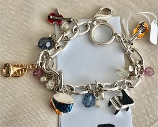 $20.00.   Charming BRIGHTON musical instrument charm bracelet.  Rhodium plated.  7" long.