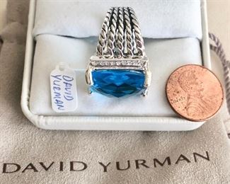 $300.00.  David Yurman topza/diamond ring.  Please see previous description.