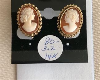 $80.00.   Vintage 14k yellow gold cameo earrings with screw clasp.  Cameo measures .75" long.