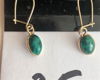 $50.00.   14k yellow gold wires with malachite drop in 14k wire frame.