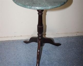 $25. Faux marble top short pedestal table/plant stand. 20 inches tall.