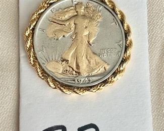 $10.00.   1943 rhodium plated walking liberty half dollar pendant.  Ready for your favorite chain.  Four (4) of these are available,