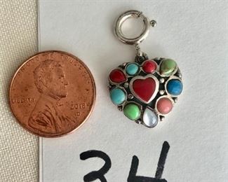 $15.00.    Sterling silver turquoise, coral, + charm/pendant.