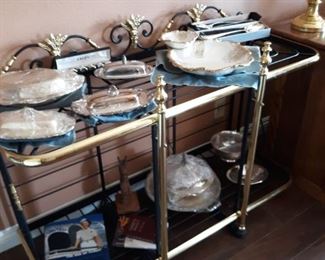 Silverplate serving pieces on Brass and metal 2 tier shelf unit