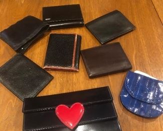 Italian leather wallets, clutch purse, and eel coin purse  $20 - $80