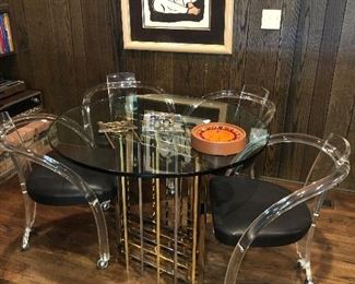 Acrylic Club Chairs - Set of 4 -  $1200, 40" Round Brass and Glass Game table with chrome and brass base - $450, Gorman print - $1200 