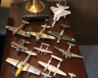 Airplanes:  cast aluminum - several to choose from :)
