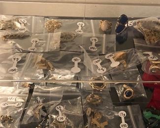 Another view of gold- 10, 14, and 18 karat pieces. Some also with semi precious stones
