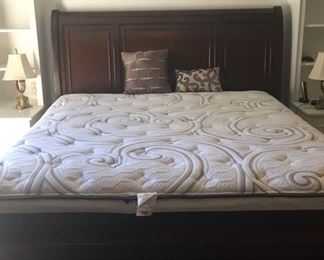 Almost brand new king size mattress and stylish headboard and frame.