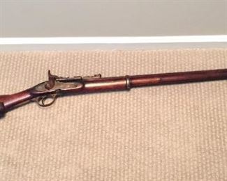 An 1865 Tower, two band, percussion musket.