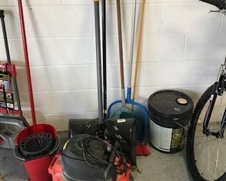 Garden tools and wet-dry vac.