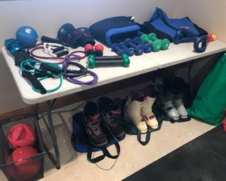 Exercise equipment. Weights. Ski shoes. Scuba suit 