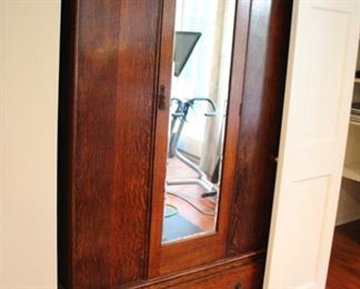 Arts & Crafts style oak armoire with mirrored door (75 1/2"h x 42"w x 16"d) - with shelving & hanging space Asking $250