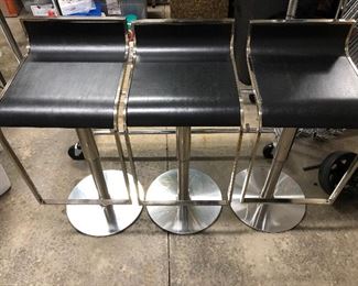 3 black and chrome bar stools. Adjustable height. $150 for all three
