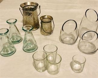 Set of 3 4" green stem vases $7. Set of two candle lanterns 5" and 3" $7 pr. Set of three cut class candle holders 6", 4", and 3" $10/3. Set of four candle votives $1. 