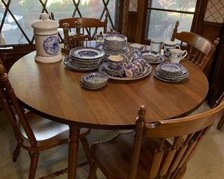 Tell City hard rock maple kitchen table with 2 leaves, 6 chairs (one of them a captains style chair)..Excellent condition.