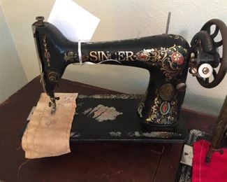 We have two of these Singer Sewing Machines, this one is dated 1922