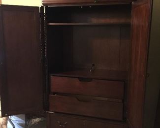 Cherry Armoire which can be used for a TV or clothes storage, great condition