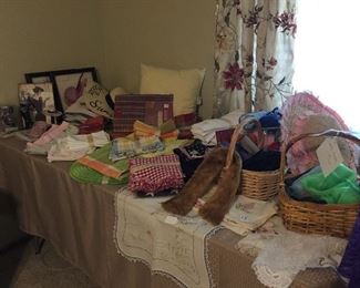 Bathroom linens and accessories, table linens, towels, vintage scarves, we have lots of doilies.