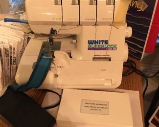 White Superlock 2000 Serger with manual and VHS tape