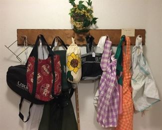 Lots of vintage aprons, crock pot bags